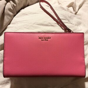 Kate Spade pink Leather Wristlet / Wallet with Gold Logo J183